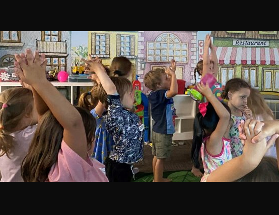 kids stretching and playing