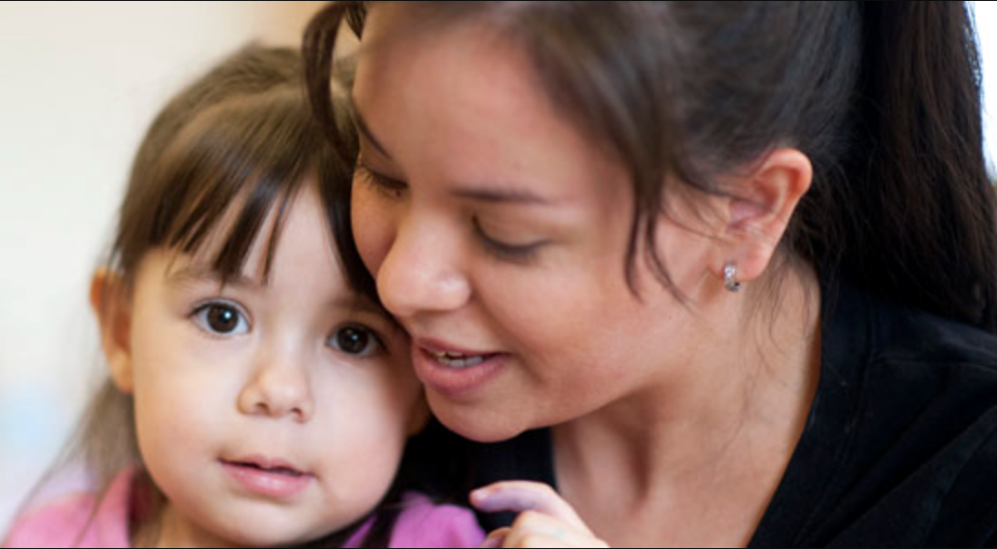 A mother taking care of her child